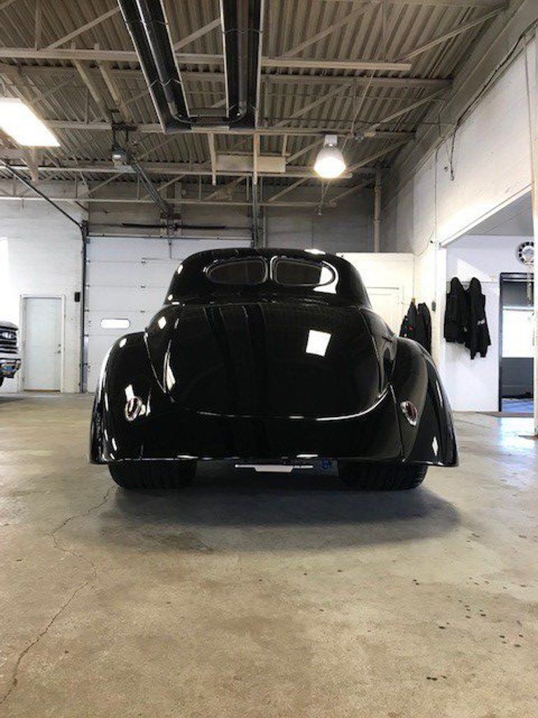 total rear view of custom black 1941 willys coupe