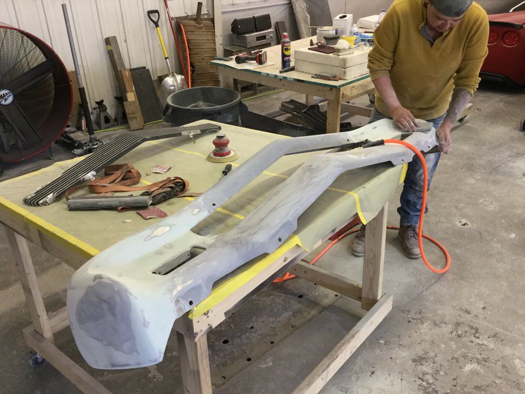front car fender on workbench