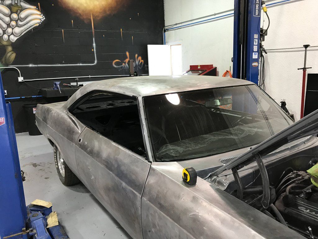 passenger side view of car looking in