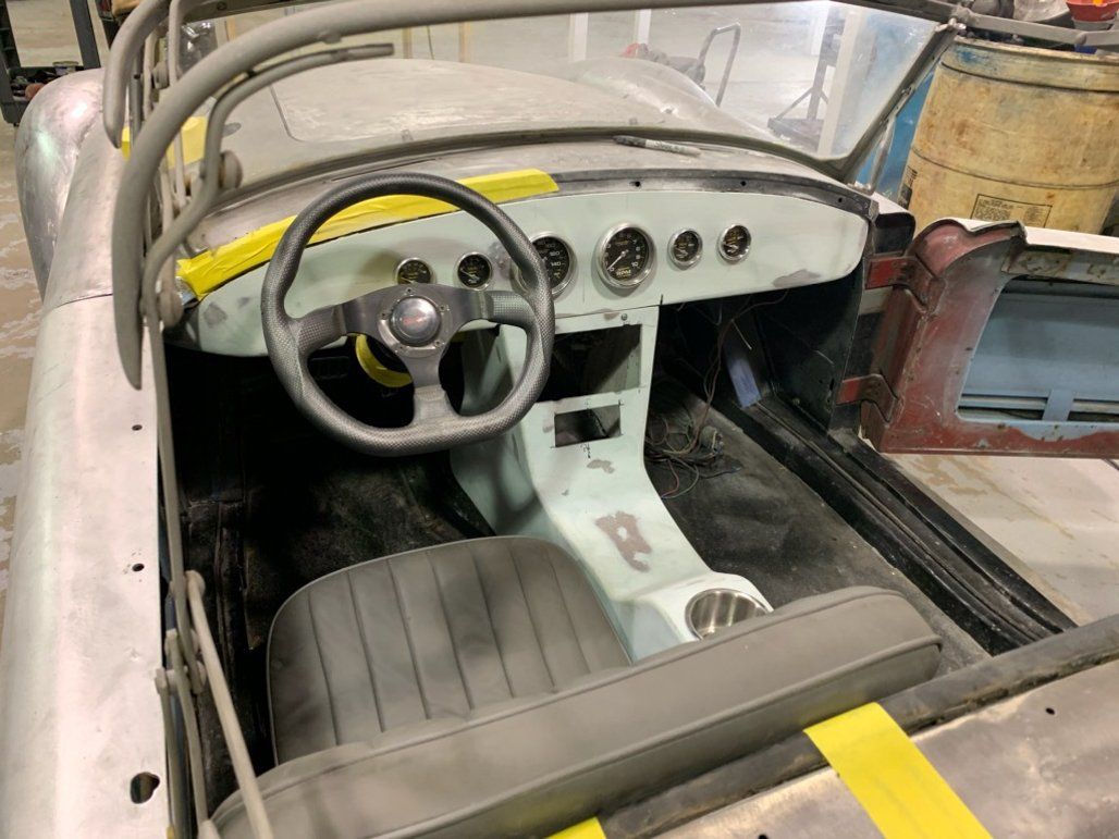interior view of driver seat with front passenger seat removed