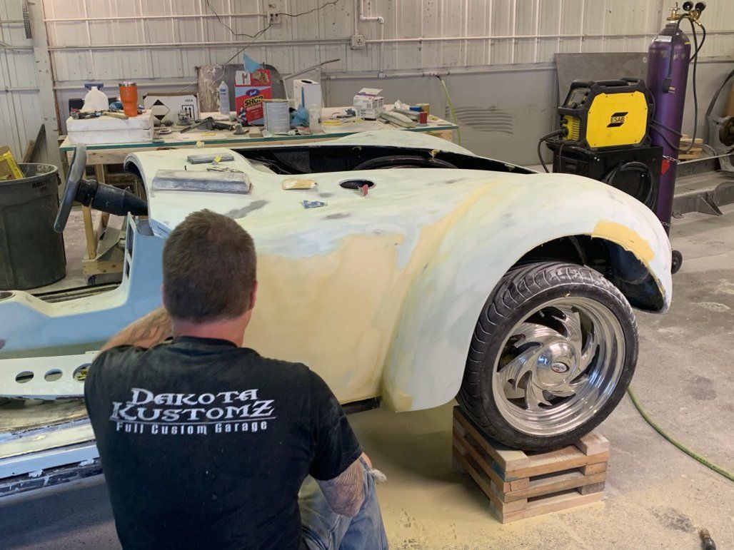 sitting working looking at side of cadr