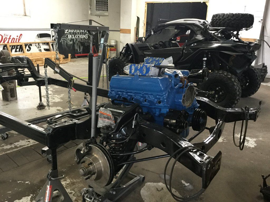 side view of engine suspended