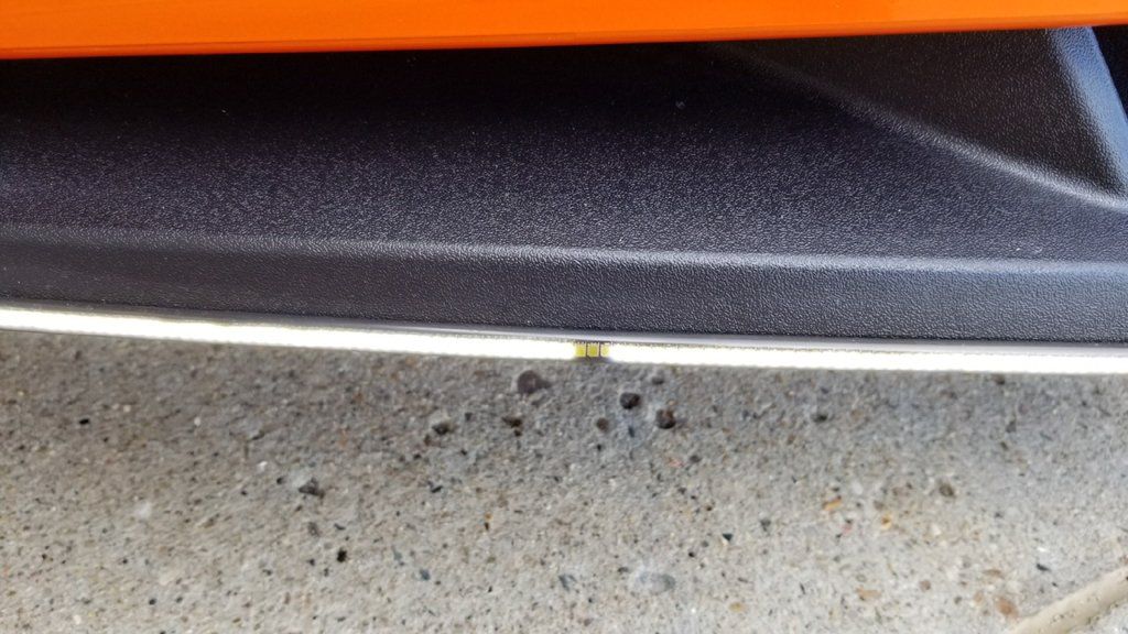 custom orange and black polaris slingshot LED closeup