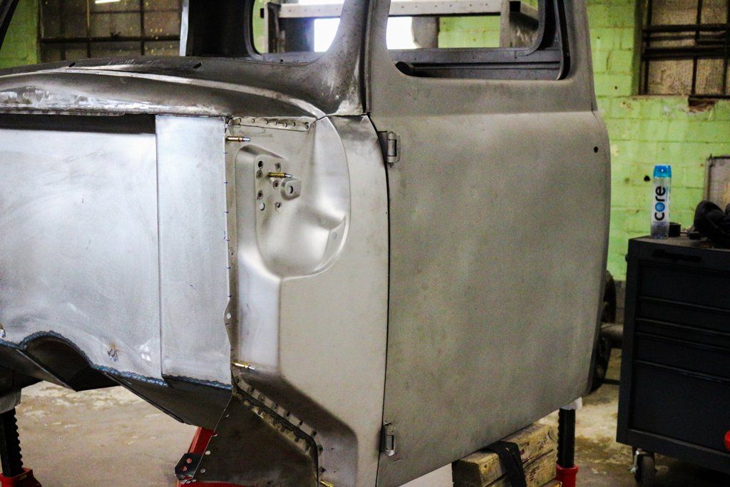 view of truck hinge where hood used to be