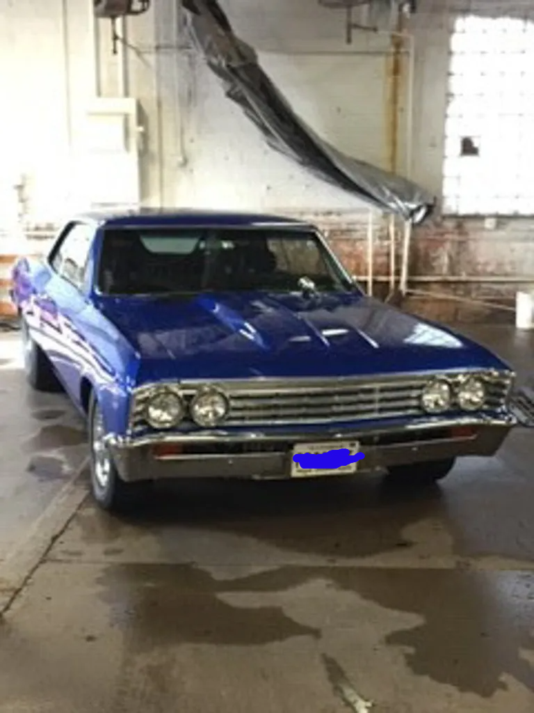 front view of car in service garage