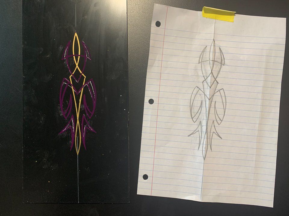 purple and yellow pinstripe design with sketch of pinstripe design