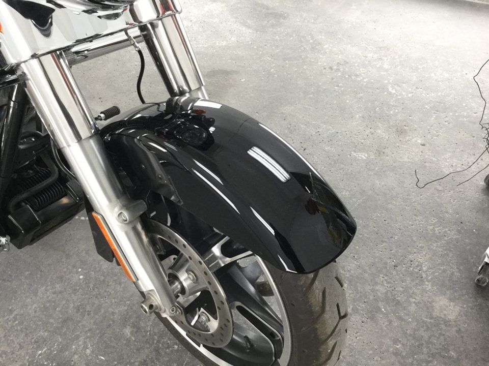 close up of rear fender of black motorcycle