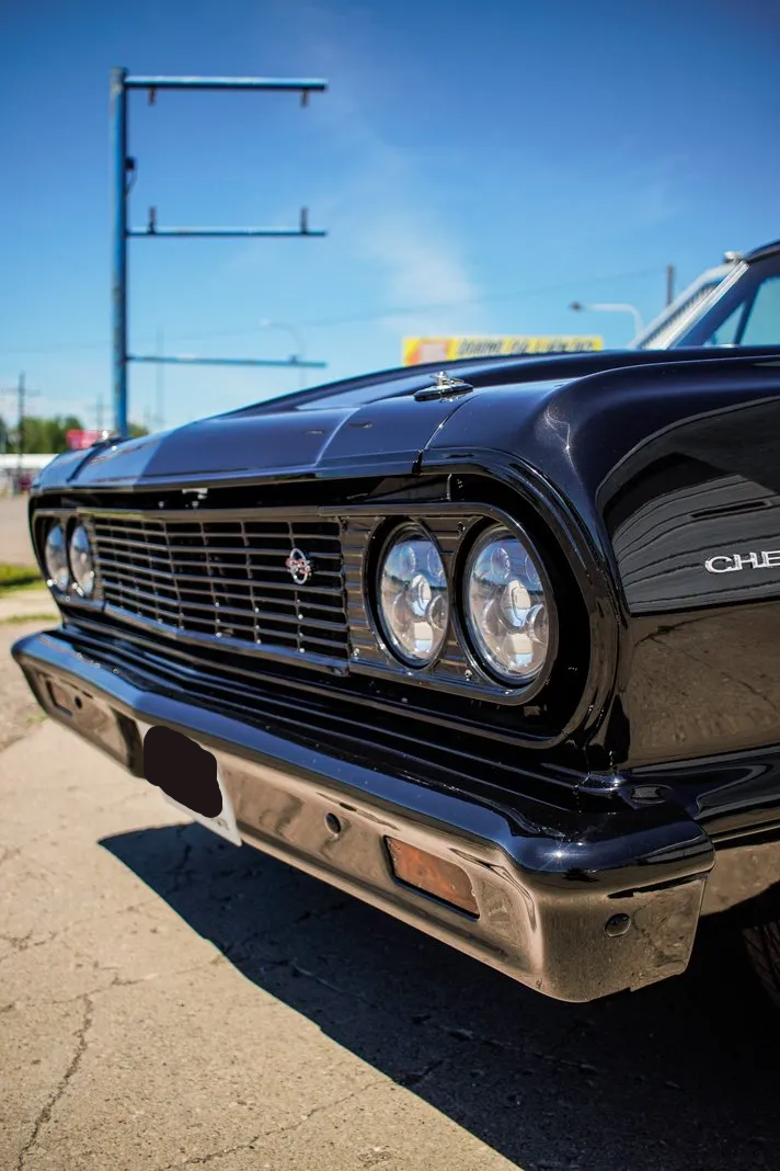 close up of front fender and headlights of muscle car