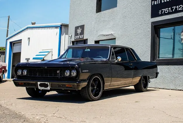 front view of muscle car in front of Dakota Kustomz garage