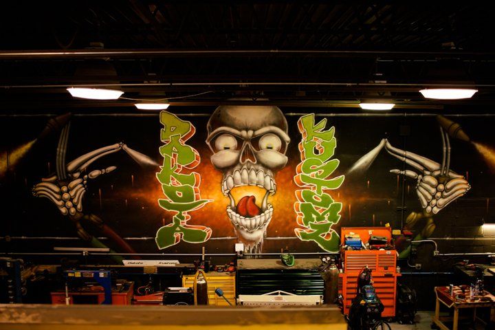 Dakota Kustomz graffiti shop skull wall art
