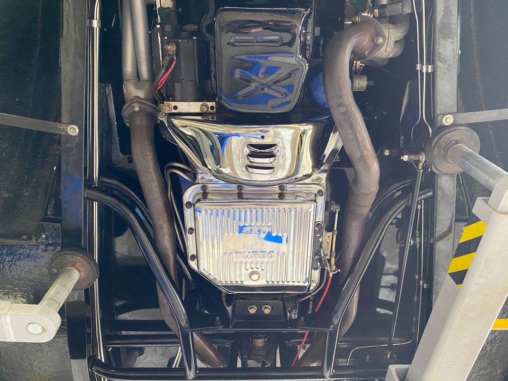 custom black 1937 ford tudor hot rod engine