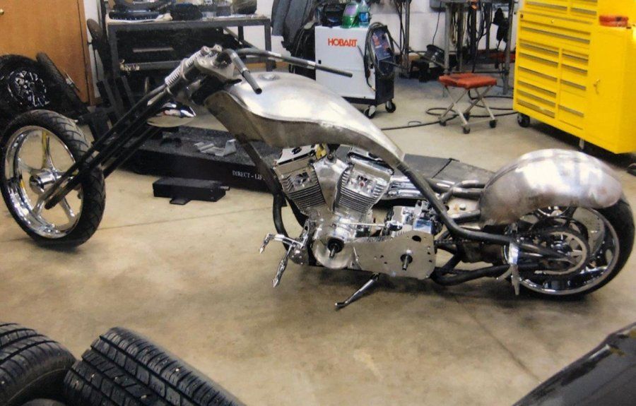 side view of chopper in garage