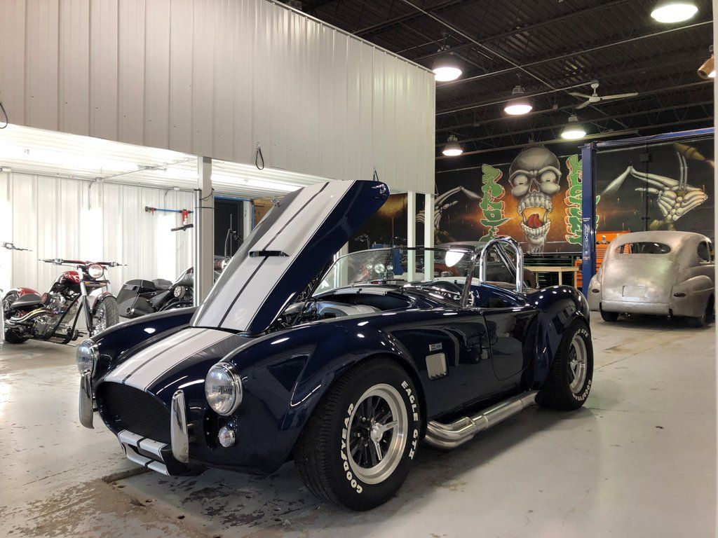 hotrod in garage with hood open
