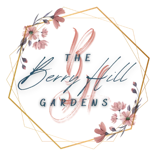 Logo for The Berry Hill Gardens with pink flowers and gold geometric frame on a white background