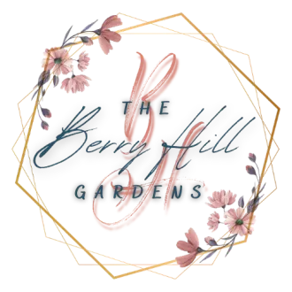 Logo for The Berry Hill Gardens with pink flowers and gold geometric frame on a white background