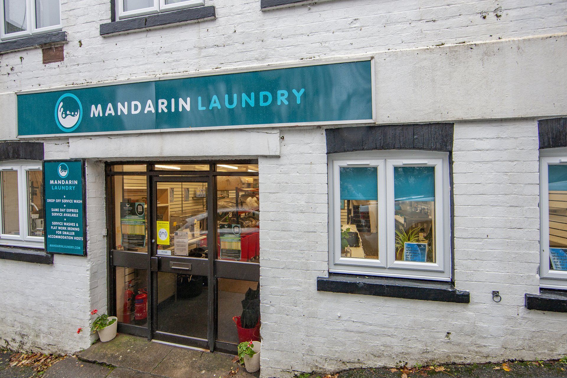 Mandarin Laundry logo