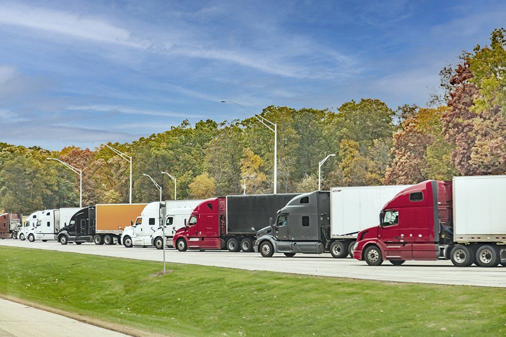 A Line of Semi Trucks | Commerce City, CO | Complete Fleet Services