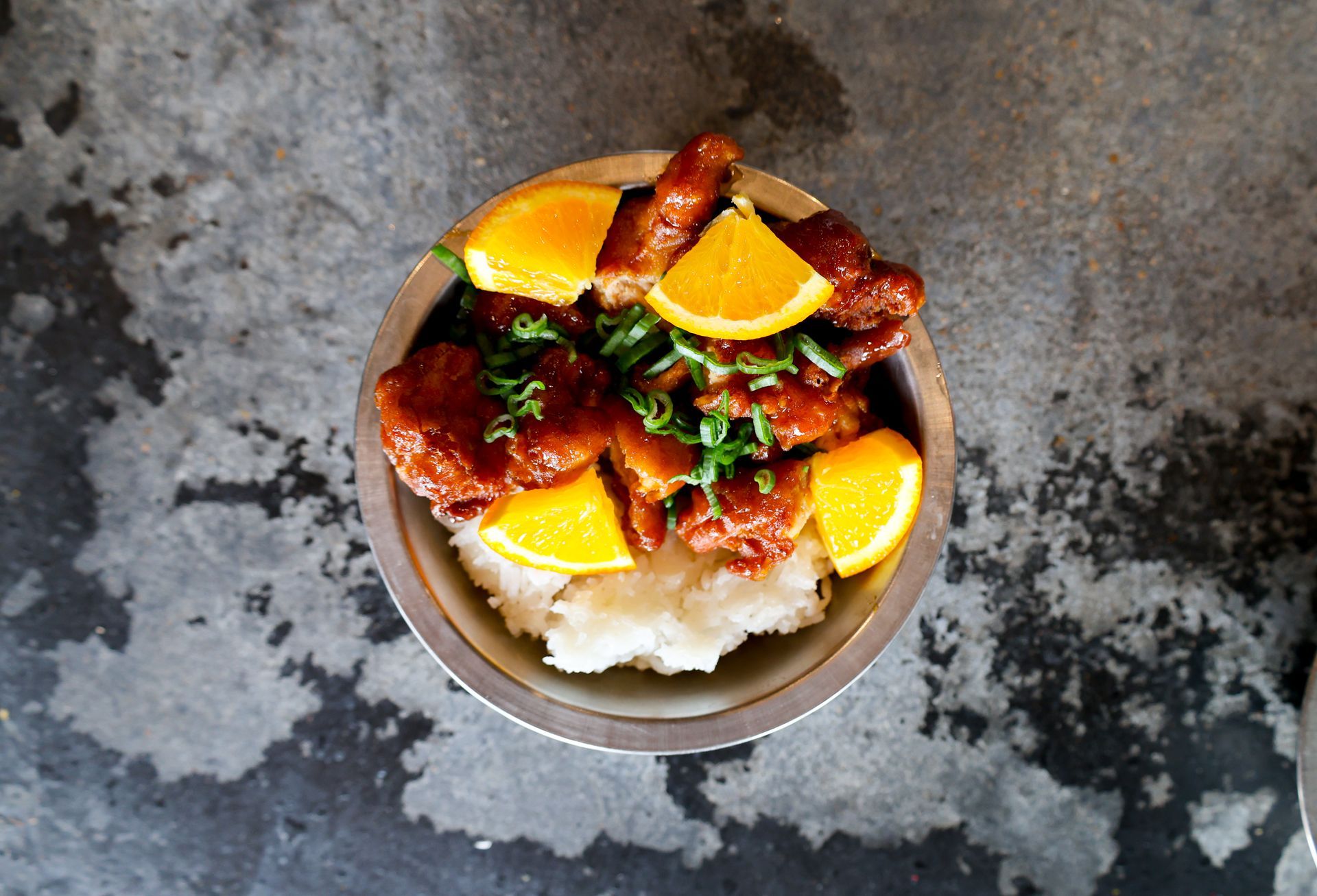 Crispy orange chicken glazed in sweet heat — a comfort classic with an Austin twist. The perfect fall bite when you’re craving something cozy, tangy, and impossible to put down.