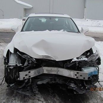 white car font end damage