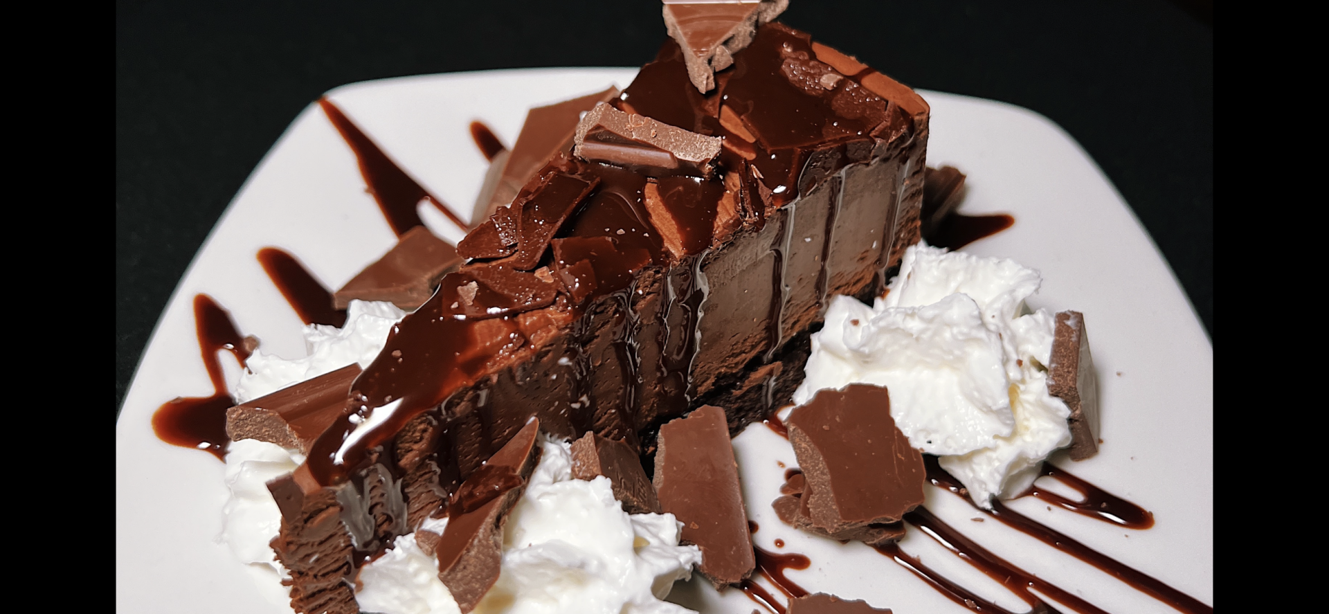 Our Chocolate Mousse Cake topped with Imported Italian Chocolate makes this slice of Cake a work of art