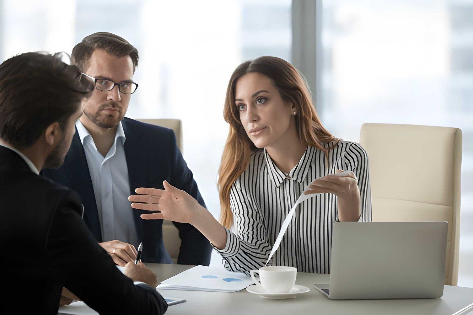 Three Professionals in a Bright Office Meeting — Australian Employee Lawyers in Broadbeach Waters, QLD