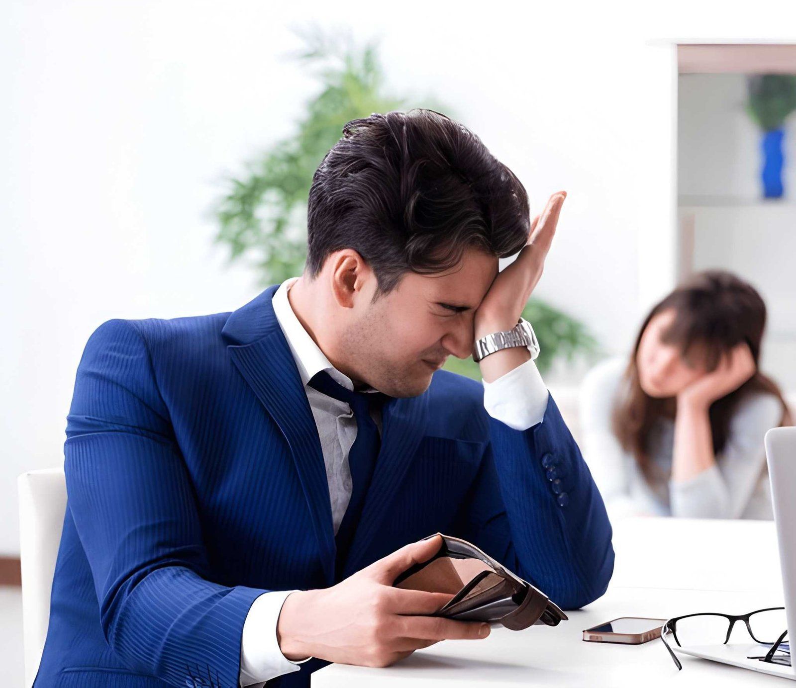 Employee Distressed While Sitting on a Desk — Australian Employee Lawyers in Broadbeach Waters, QLD