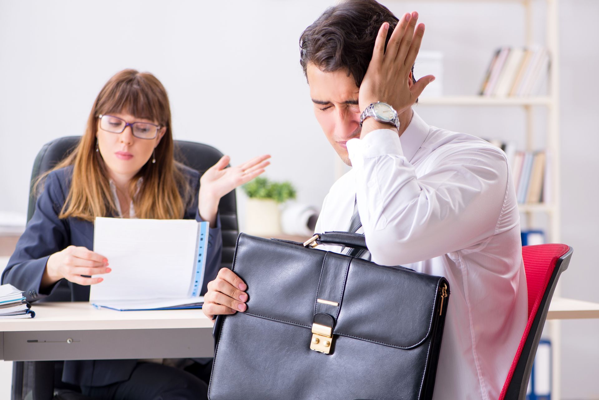 Employee Who Looks Distressed With a Bag — Australian Employee Lawyers in Broadbeach Waters, QLD