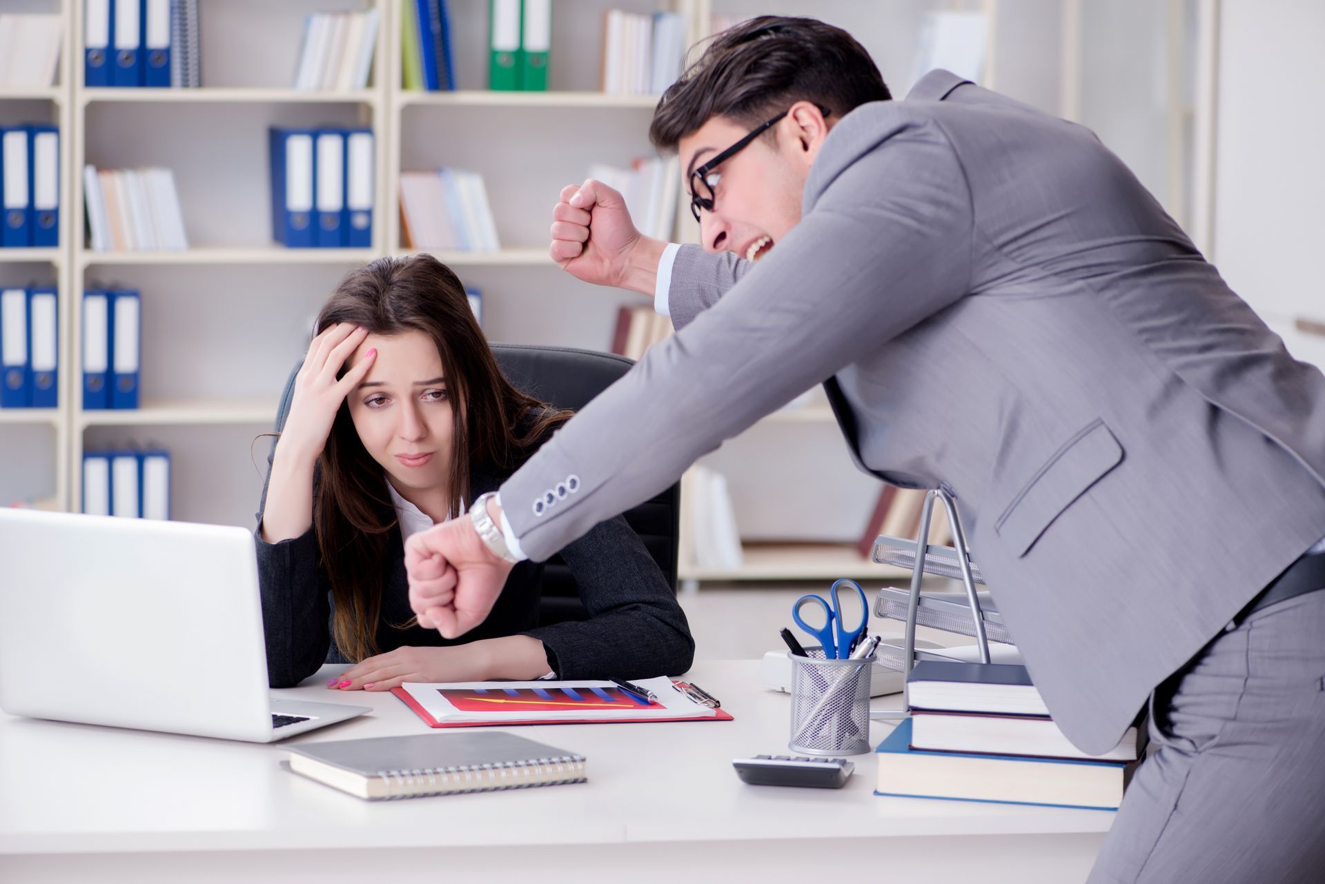 A Manager in a Gray Suit Gestures Angrily on the Employee — Australian Employee Lawyers in Broadbeach Waters, QLD