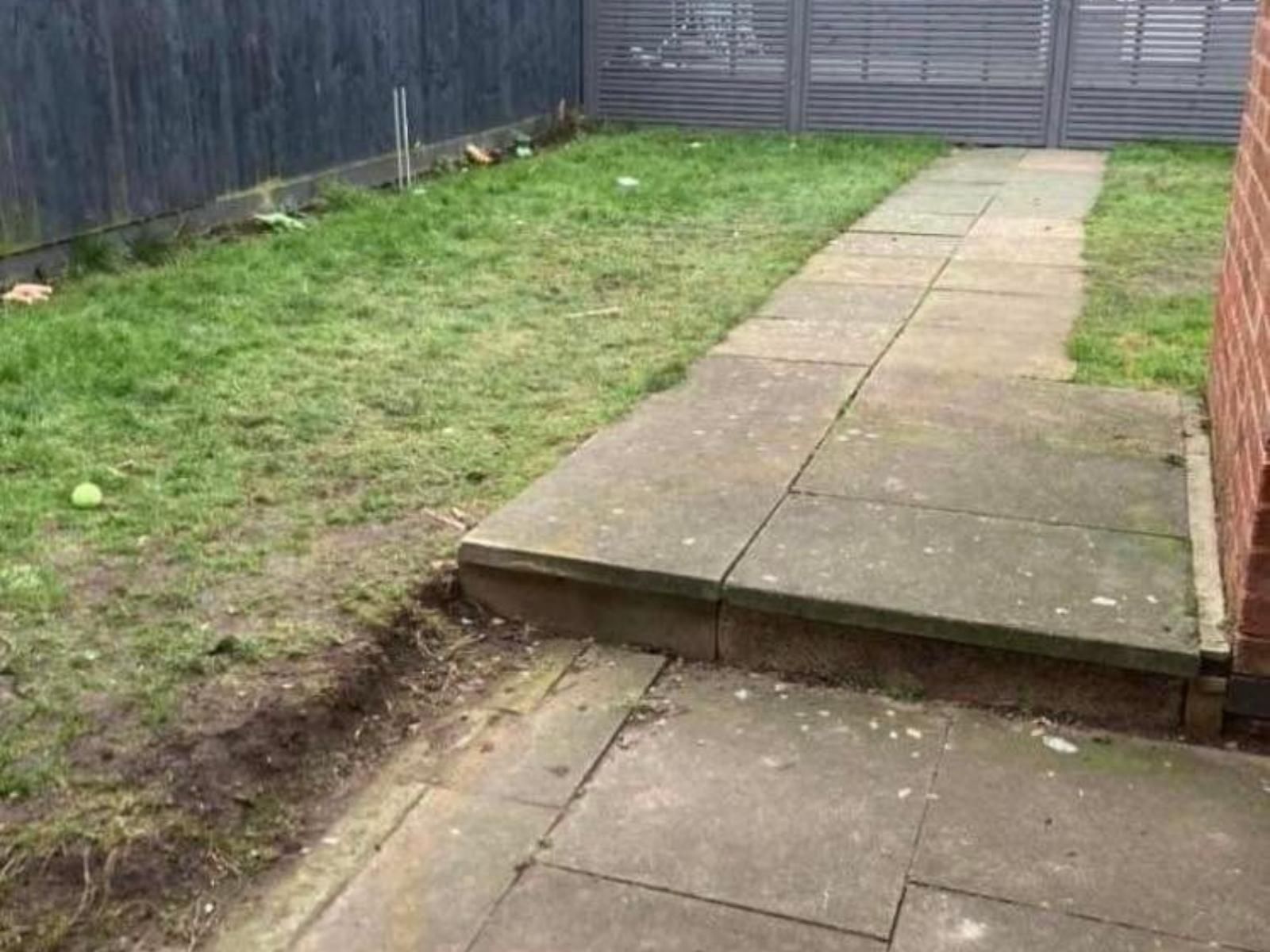 Bespoke Artificial Grass Peterborough about to remove the existing turf and path and replace it with fake grass