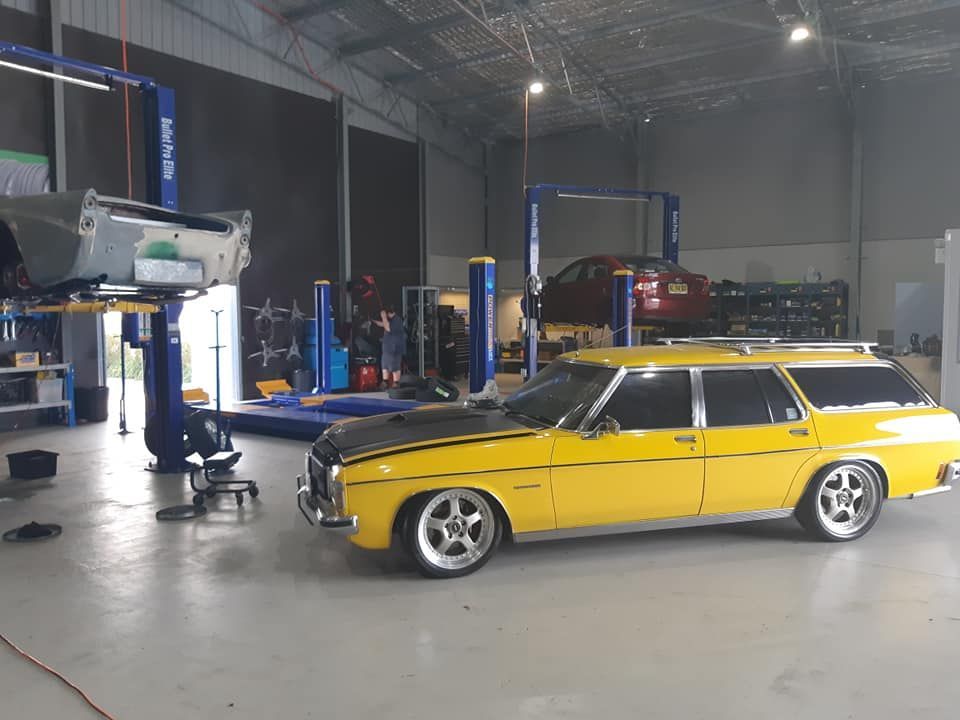 Yellow Car For Repair — Wyong, NSW — Kanwal Muffler Mechanical & Towbars