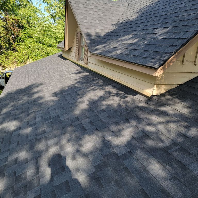 The roof of a house with a black shingle roof. - Spokane Valley, WA