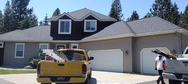 Yellow truck in front of the House - Spokane Valley, WA