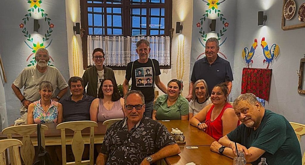 Tour attendees and guides gather at restaurant in Krakow, Poland.