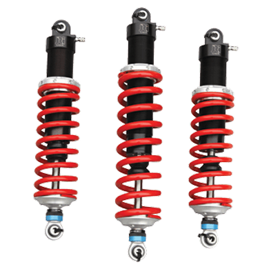 Three red and black motorcycle shock absorbers. | Importsports