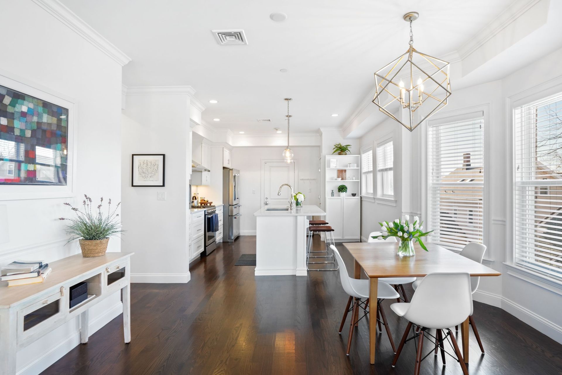 interior photo of dining room with view of kitchen