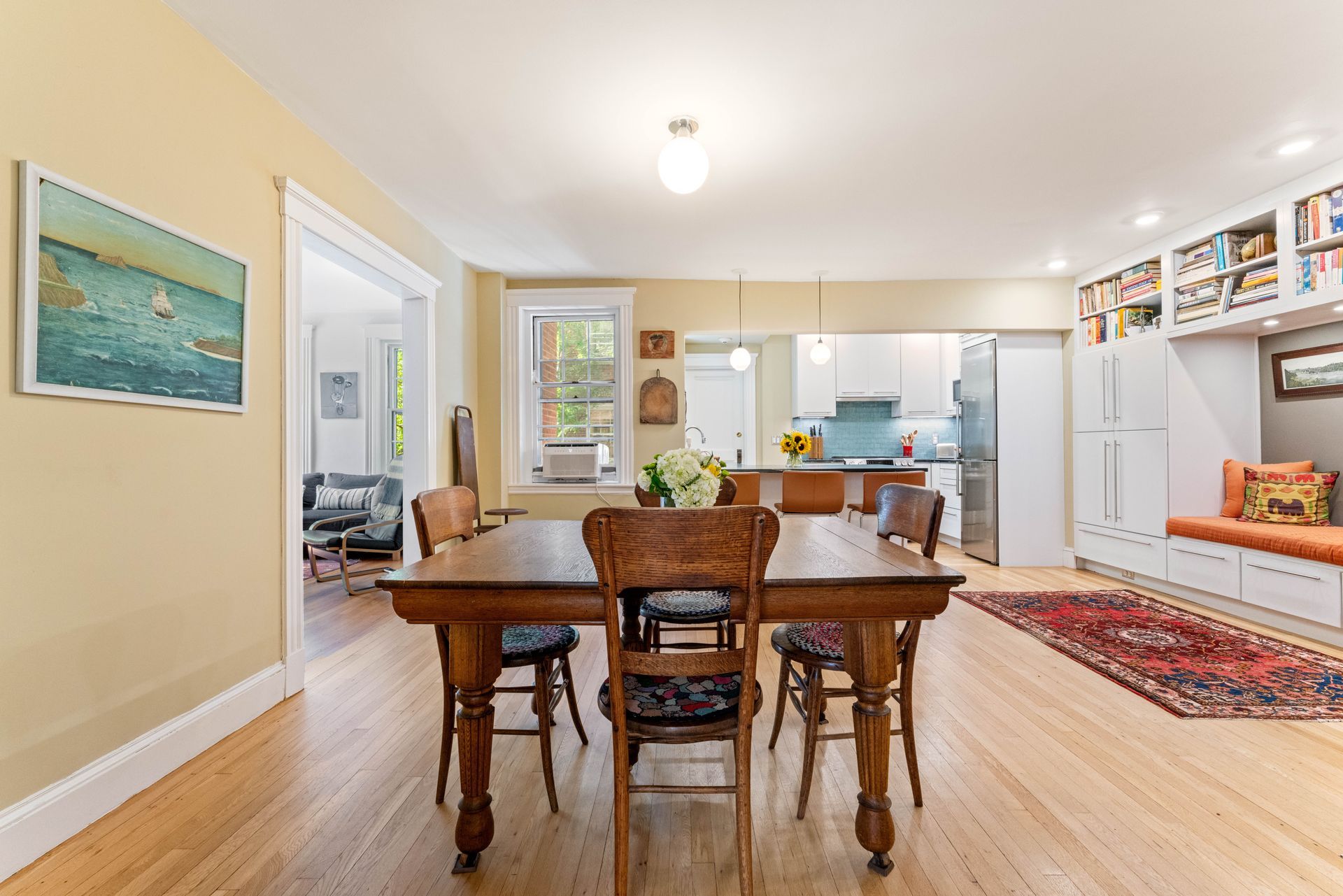 View of dining area with kitchen and reading nook