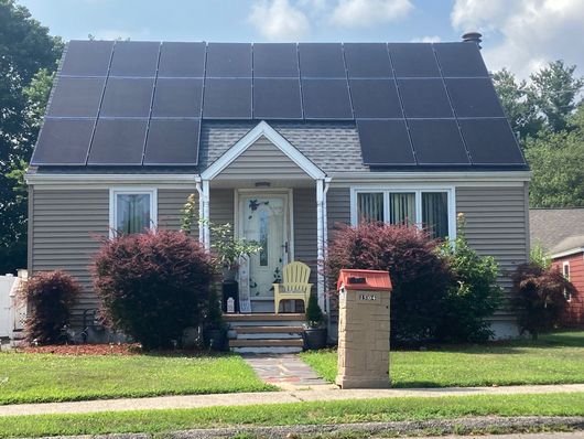 A house with solar panels on the roof