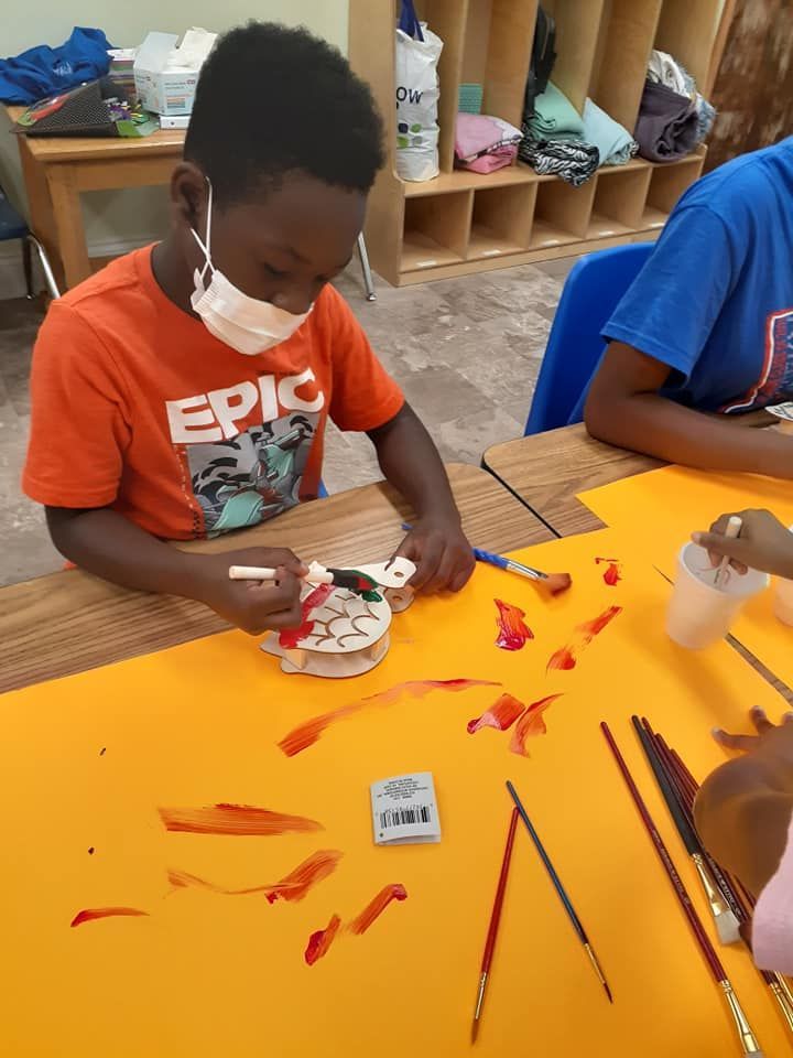 kids learning to paint