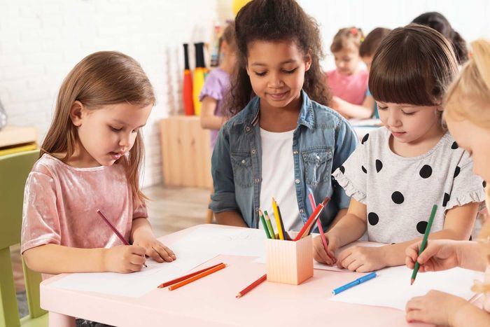 adorable children drawing together