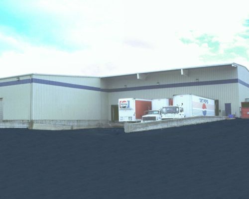  A Warehouse with A Lot of Trucks Parked in Front of It - Redmond, WA - Commercial Industries