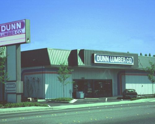 A Dunn Lumber Co Building with A Car Parked in Front of It - Redmond, WA - Commercial Industries