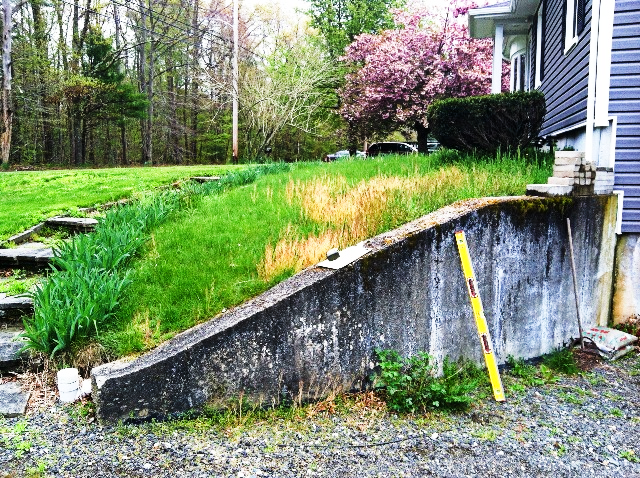 A before picture of a walkway job for Leonards Landscaping Corp.