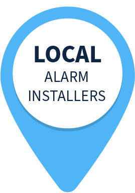 A pin that says local alarm installers on it.