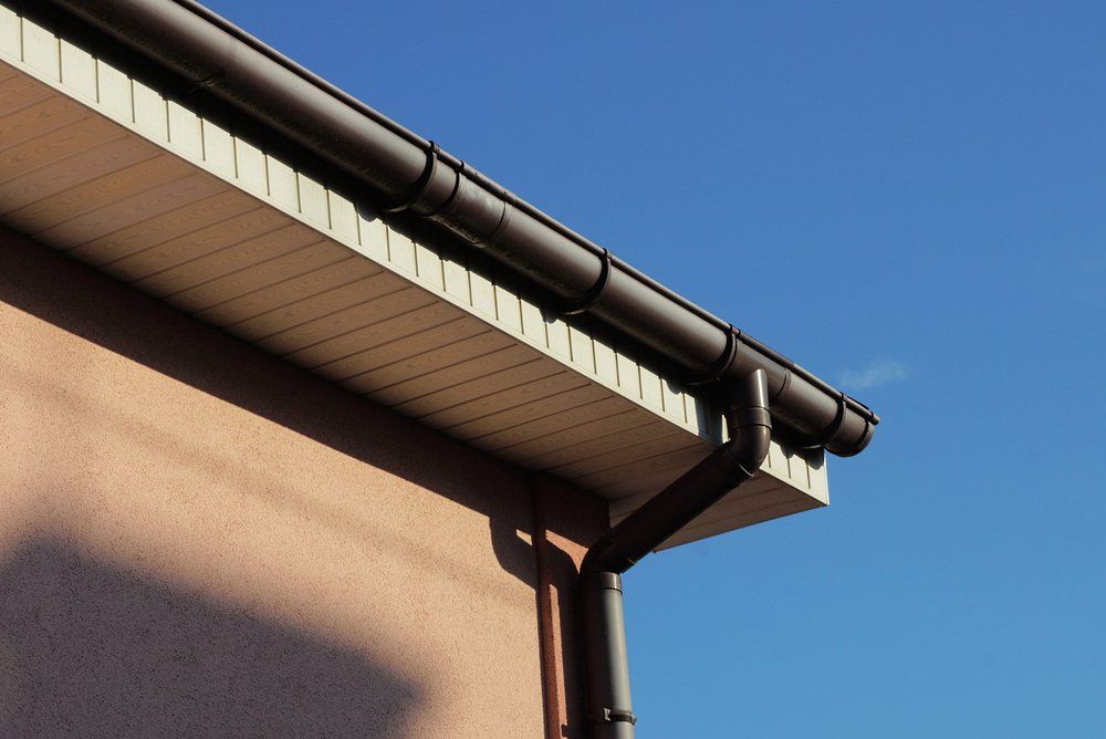 Black Plastic Gutter Pipe — Atlanta, GA — JH Gutters LLC