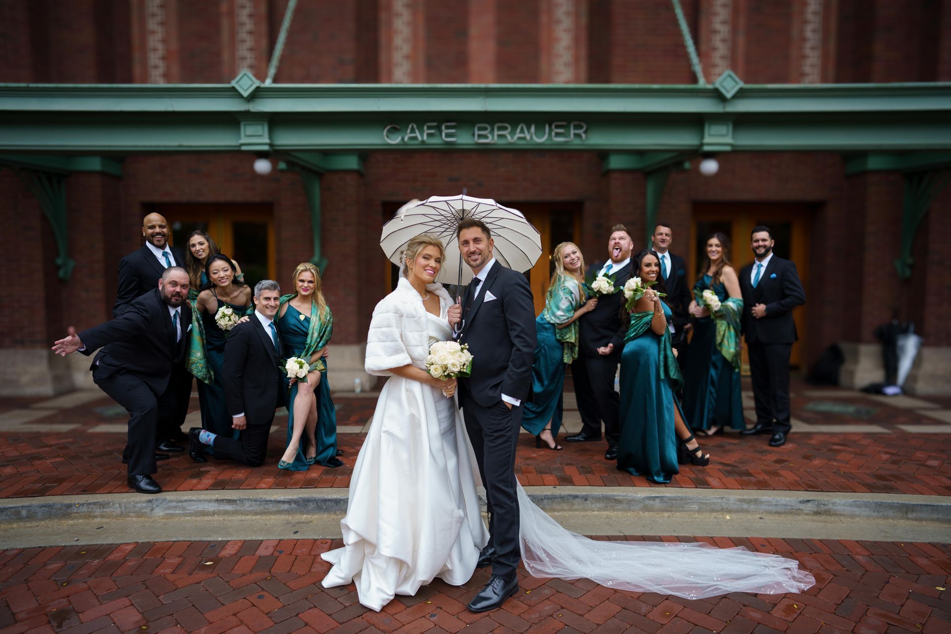Wedding party poses outside 