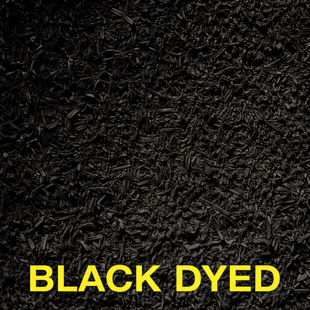 A close-up of dark black wood mulch with the text 