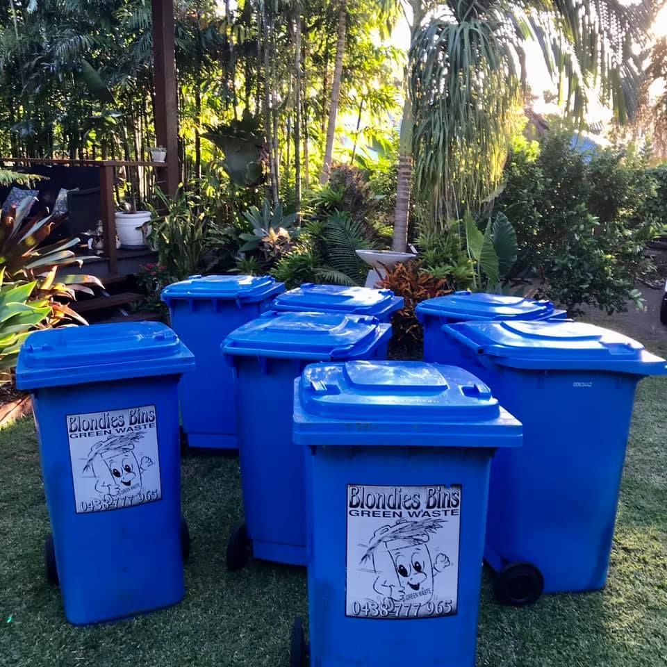 A Bunch Of Blue Garbage Cans With The Words Buddy 's Bins — Blondies Bins in East Mackay, QLD