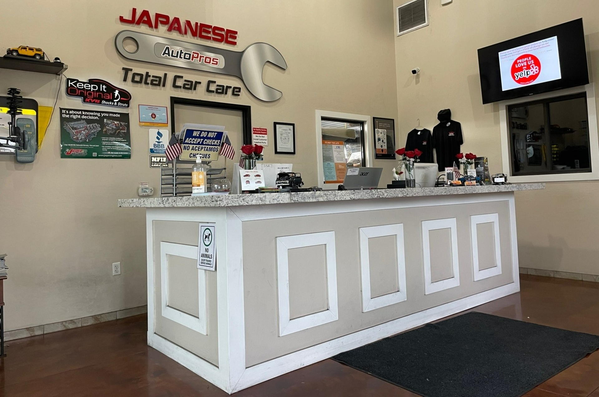 A reception desk in a japanese total car care shop