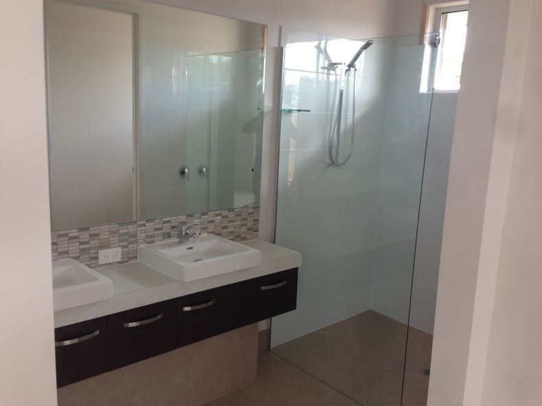 View of frameless shower glass door