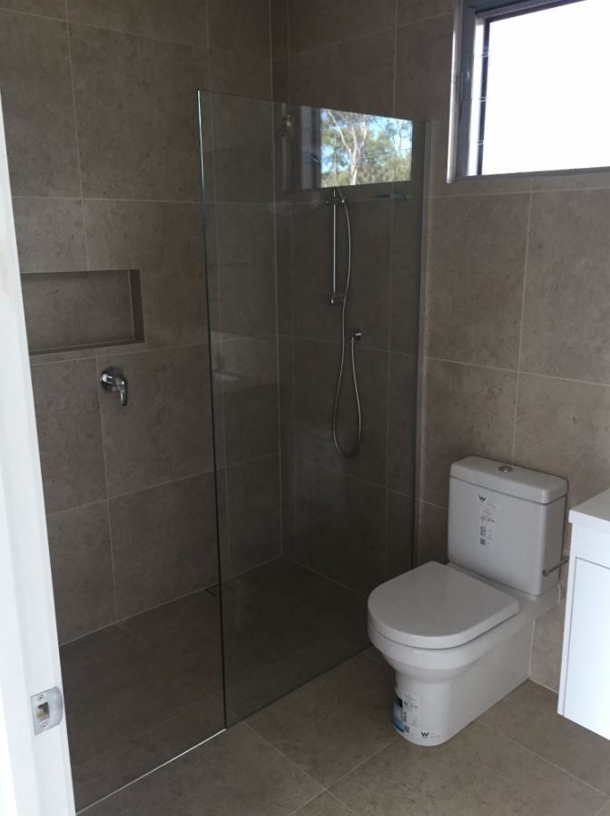 View of frameless shower glass door